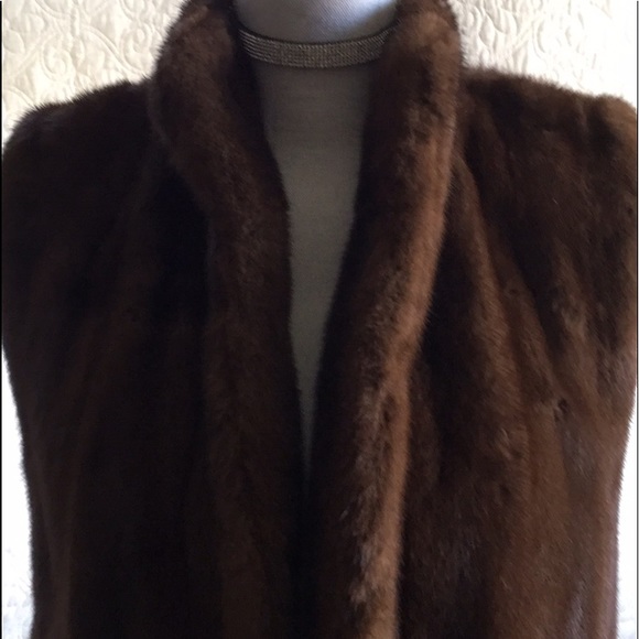 MINK VEST with garment bag and two mink hats.